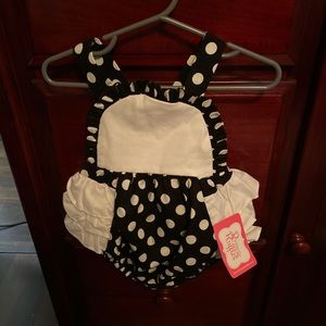 Ricrac and Ruffles. Runs small